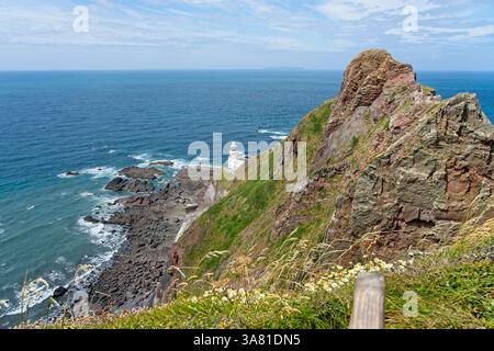 Le phare de Hartland point dans le Devon en Angleterre marque la limite ouest du côté anglais du canal de Bristol avec l'océan Atlantique qui continue jusqu'à la fin de la période Banque D'Images