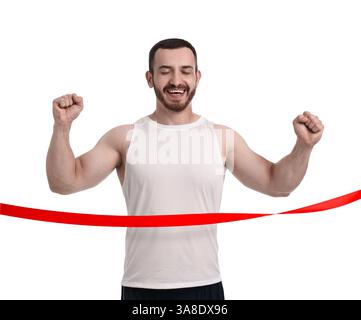 Heureux sportif traversant le ruban de ligne de finition rouge sur fond blanc Banque D'Images