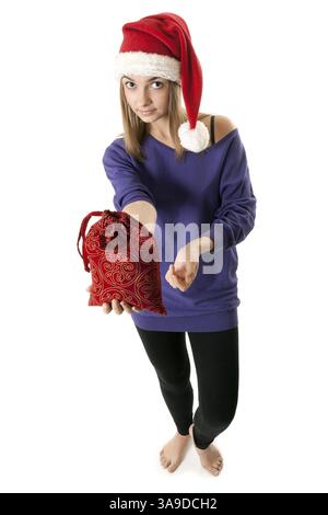Belle fille de rouge Santa hat sur un fond blanc Banque D'Images