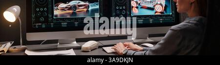 En-tête de jeune designer féminin tapant sur le clavier d'ordinateur et regardant l'écran avec des modèles graphiques d'automobile dans le bureau Banque D'Images