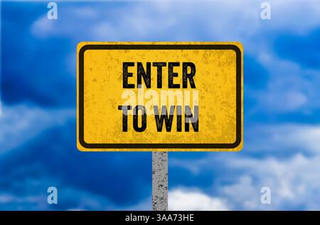 Participez pour gagner un message écrit sur un panneau métallique jaune. Entrez conceptuel pour gagner le symbole. Copier l'espace. Banque D'Images