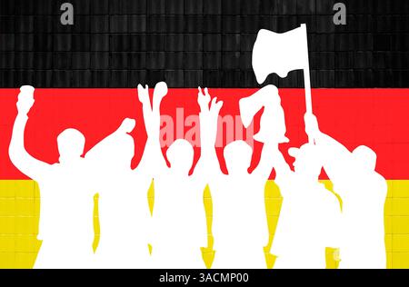 Silhouette blanche de fans célébrant devant un mur noir, rouge et jaune Banque D'Images