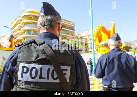 Menton, France - 16 février 2019 : 86e Fête du citron / 86e Fête du citron à Menton : présence policière lors de l'inauguration, Einweihung. Bioves Garden, Polizei, Polizia, jardin, Garten, Tourismus, Zitronenfest, Tourisme, Orange, oranges, Zitrone, Zitronen, Festival, Banque D'Images