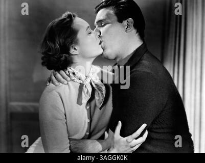 Christine White, Neville Brand, sur le plateau du film, 'Man Crazy', 20th Century-Fox, 1953 Banque D'Images