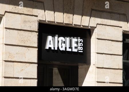 Bordeaux , France - 04 09 2025 : aigle 1853 enseigne boutique logo et magasin texte marque main faire bottes chaussures signalétique française chaussures boutique faca Banque D'Images