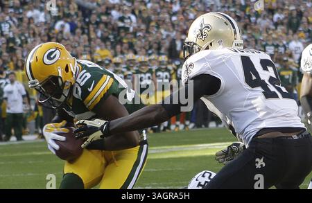 30 septembre 2012 - Green Bay, WI, États-Unis - Greg Jennings des Green Bay Packers tire une passe pour un touchdown en première mi-temps contre les Saints de la Nouvelle-Orléans Isa Abdul-Quddus le dimanche 30 septembre 2012 au lambeau Field de Green Bay, Wisconsin. (Crédit image : © John Klein/MCT/ZUMAPRESS.com) Banque D'Images