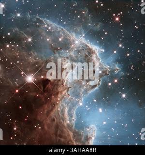 La brillante tapisserie de jeunes étoiles qui prennent vie ressemble à un feu d'artifice scintillant dans l'25 image du télescope spatial Hubble de la NASA pour commémorer un quart de siècle d'exploration du système solaire et au-delà depuis son lancement le 24 avril 1990.'Hubble a complètement transformé notre vision de l'univers'', a déclaré John Grunsfeld, astronaute et administrateur associé de la Direction de la mission scientifique de la NASA. « Cette vue de feux d'artifice étoilés et de gaz incandescent est une image digne de notre célébration de 25 ans d'étonnante science Hubble. 'La pièce maîtresse étincelante de l'anniver d'argent de Hubble Banque D'Images