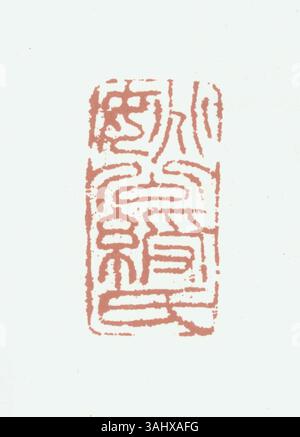 Un sceau chinois traditionnel fabriqué en chinois simplifié, utilisé pour authentifier les documents et les œuvres d'art avec une empreinte à l'encre rouge symbolisant l'autorité et la propriété. Banque D'Images
