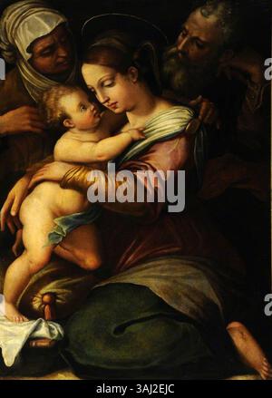 Cette peinture religieuse du XVIe siècle, attribuée à un disciple de Giorgio Vasari, représente la Sainte famille avec Sainte Anne, mettant en évidence des figures bibliques clés. Banque D'Images
