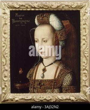 Ce portrait, réalisé vers 1510, représente Marguerite d'Autriche, duchesse de Savoie, sous l'apparence de Marie-Madeleine. La peinture à l'huile sur panneau montre qu'elle tient un bocal de pommade, symbolisant le rôle de Marie-Madeleine. L'œuvre est attribuée à l'Atelier du Maître de la légende de la Madeleine. L'inscription 'Marie de Bourgogne, 1457-1482' est apocryphe. Actuellement logé au Musée Condé. Banque D'Images