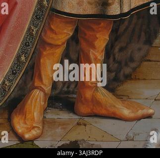 Ce détail recadré de la peinture « Adoration of the Mages » de Jan Gossaert (1510-1515) montre les chaussures portées par les Mages bibliques. Les détails méticuleux illustrent le savoir-faire artisanal de Gossaert et l’attention portée à la texture dans ses œuvres de la Renaissance. Banque D'Images