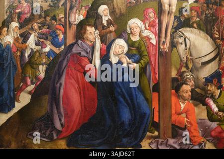 La Crucifixion, attribuée au Maître de Dreux Budé, représente la crucifixion du Christ. Cette peinture à l'huile du XVe siècle montre Jésus sur la croix, accompagné de la Vierge Marie et d'autres personnages dans une scène religieuse solennelle. Il illustre l'art chrétien médiéval et la dévotion religieuse. Banque D'Images
