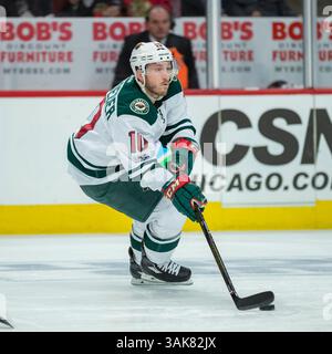 12 mars 2017 : Chicago, Illinois, États-Unis - Wild #10 Jordan Schroeder en action lors du match de la Ligue nationale de hockey entre les Blackhawks de Chicago et le Wild du Minnesota au United Center à Chicago, il. (Image de crédit : &copy ; Mike Wulf/CSM via ZUMA Wire) Banque D'Images