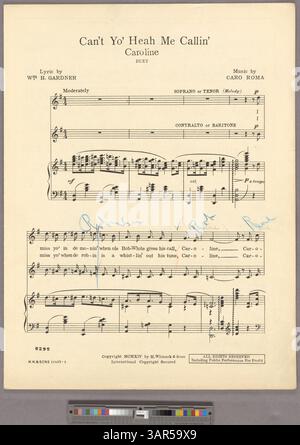 La chanson 'Can't Yo' Heah me Callin' Caroline' est présentée comme un duo en sol majeur, avec des détails de gamme vocale. La couverture comprend des publicités pour d'autres chansons, dont The Sunshine that Fills My World d'Ernest R. Ball. Banque D'Images