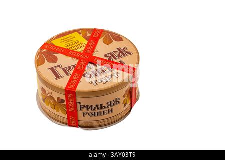 03.24.25 Lviv Ukraine la boîte ronde présente une variété de gâteaux, magnifiquement emballés avec des motifs sur le thème de l'automne. Parfait pour le partage pendant le rassemblement Banque D'Images