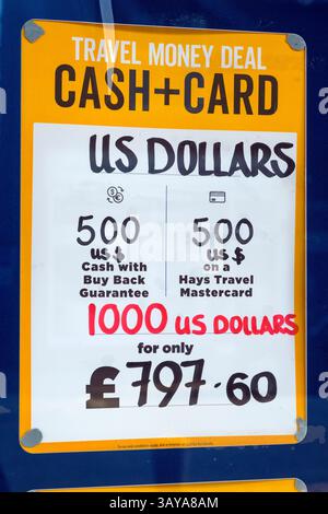 Signe de publicité voyage taux de change pour GB livres sterling en dollars américains en avril 2025, Glasgow, Écosse, Royaume-Uni, Europe Banque D'Images