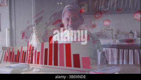 Image de graphiques et de cellules virales sur un homme senior biracial triste assis seul à la maison Banque D'Images