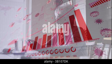 Image de cellules virales et graphiques sur une femme senior biraciale utilisant un smartphone Banque D'Images