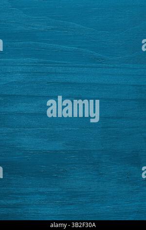 Fond de planche en bois peint bleu. Surface en bois rugueux bleu avec grain. Banque D'Images