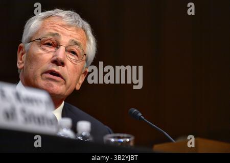Le 3 septembre 2013 - Washington, District of Columbia, États-Unis d'Amérique - le secrétaire américain à la Défense Chuck Hagel lors d'une audition sur la Syrie devant la Commission des relations étrangères du Sénat au bureau du Sénat Hart le 3 septembre 2013 à Washington DC. Au cours de l'audition, Kerry, Hagel et le président des chefs interarmées Gen. Martin Dempsey ont discuté d'une possible intervention militaire en réponse à l'utilisation d'armes chimiques par la Syrie contre leur propre peuple. (Crédit image : © MCS1 Daniel Hinton/Planet Pix via ZUMA Wire) Banque D'Images