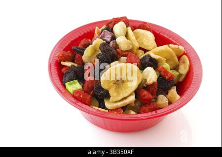 Bol Rose avec des fruits secs isolated over white background Banque D'Images