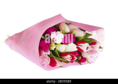 Bouquet de tulipes colorées enveloppé de rouge rose et blanc Banque D'Images