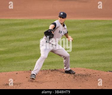 11 août 2014 - Baltimore, Maryland, US - Chris Capuano (26), lanceur des Yankees de New York, travaille en première manche contre les Orioles de Baltimore à Oriole Park à Camden Yards à Baltimore, MD, le lundi 11 août 2014. (Crédit image : ©Ron Sachs/CNP via ZUMA Wire) Banque D'Images