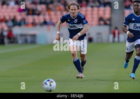 12 mars 2022, Houston, Texas, États-Unis : Florian Jungwirth (26 ans), milieu de terrain des Whitecaps de Vancouver, court après le ballon lors du match entre le Houston Dynamo FC et le Vancouver Whitecaps FC au PNC Stadium de Houston, Texas, le 12 mars 2022. Houston Dynamo FC remporte la première victoire de la saison en 2-1 contre Vancouver. (Crédit image : © Lynn Pennington/ZUMA Press Wire) Banque D'Images