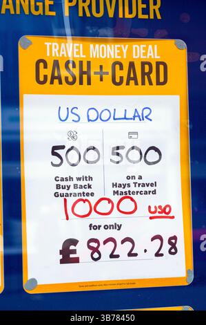 Signe de publicité voyage taux de change pour GB livres sterling en dollars américains en mai 2025, Glasgow, Écosse, Royaume-Uni, Europe Banque D'Images