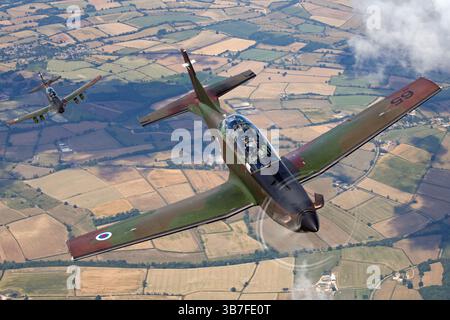 Les Embraer EMB 314 Super Tucano, immatriculés 65 et 68, sont des avions légers d'attaque et d'entraînement utilisés par plusieurs forces aériennes. Connus pour leur polyvalence et leur durabilité, ils remplissent une variété de rôles, y compris la contre-insurrection et le soutien aérien rapproché. Banque D'Images
