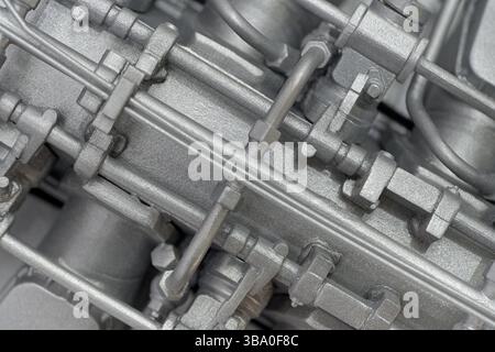Culasse d'un moteur à combustion interne. Gros plan, arrière-plan technologique abstrait. Banque D'Images