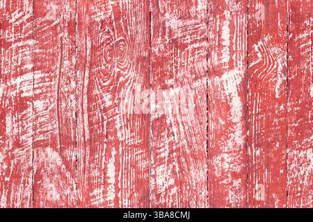 Peeling peinture bois - motif de fond rouge. Vintage Feel patine texture sans couture en bois mettant en valeur le grain du bois. Toile de fond rustique naturelle. Banque D'Images