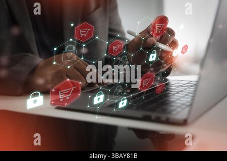 Une image de sécurité de paiement numérique montre une personne utilisant un ordinateur portable avec des icônes numériques représentant les achats en ligne, la sécurité et la protection des données flottantes Banque D'Images