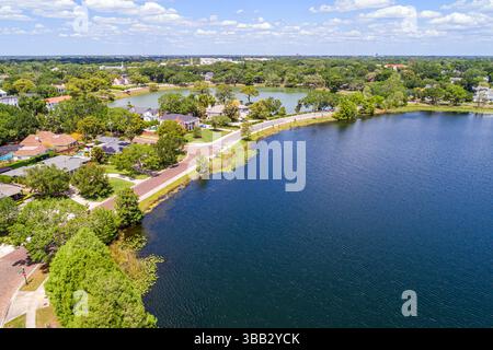 Orlando Florida, Lake Ivanhoe Park, vue aérienne d'en haut, vue panoramique sur le rivage du lac d'eau douce, maisons de front de mer de rue résidentielle de briques Banque D'Images