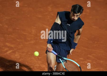 Rome, Italie. 14 mai 2025. Lorenzo Musetti, d'Italie, lors du match contre Alexander Zverev, d'Allemagne, au tournoi de tennis Internazionali BNL d'Italia 2025 au Foro Italico à Rome, Italie, le 14 mai 2025. Crédit : Insidefoto/Alamy Live News Banque D'Images