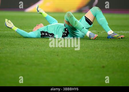 Lukasz Skorupski du Bologna FC célèbre la fin du match final de la Coppa Italia entre l'AC Milan et le Bologna FC au Stadio Olimpico à Rome (Italie), le 14 mai 2025. Banque D'Images