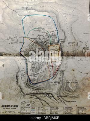 Une carte pliée de Jérusalem gravée par J. Bartholomew et publiée par Blackie & son et imprimée en 1859. La carte détaille les remparts historiques, les quartiers et les monuments de la ville, y compris le Mont du Temple, les cottages juifs et l'établissement russe près de la porte de Jaffa. Il était basé sur des travaux cartographiques antérieurs, y compris le plan de Jérusalem de Tobler en 1857. Extrait d'un album victorien et édouardien qui semble avoir été compilé par une personne anonyme. Banque D'Images