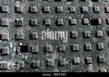 couverture de trou d'homme en fonte de 1970 Banque D'Images