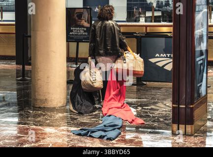 Passager dans une gare Banque D'Images