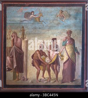 Iphigénie à Aulis peinture murale du mur nord, à l'est du péristyle - ancienne fresque romaine de l'Auguste à Herculanum, Italie - Maison du poète tragique - Maison romaine à Pompéi, Italie datant du IIe siècle av. J.-C. La maison est célèbre pour ses sols en mosaïque élaborés et ses fresques représentant des scènes de la mythologie grecque. Banque D'Images
