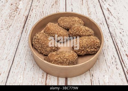 La polyvalence de la béchamel comme base a permis l'incorporation d'une étonnante variété d'ingrédients, du jambon ibérique Banque D'Images