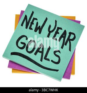 Objectifs de la nouvelle année - écriture sur un post-it, planification et résolutions concept Banque D'Images