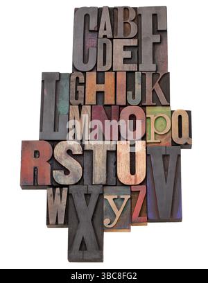 Résumé de l'alphabet anglais en bois anciens blocs de la typographie de différentes tailles et styles, isolated on white Banque D'Images