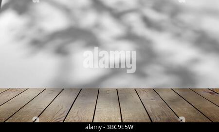 ombre des arbres se balançant doucement dans la brise, sur un fond blanc avec une table en bois. Banque D'Images