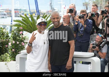 Cannes, France. 19 mai 2025. Spike Lee et Denzel Washington assistent aux 2 PLUS HAUTS appels photographiques LES PLUS BAS lors du 78ème Festival de Cannes 2025 à Cannes. Crédit : Fausto Marci/Alamy Live News Banque D'Images