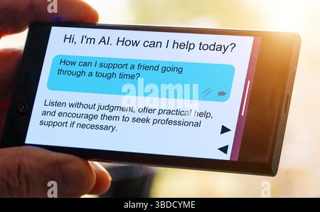 Question pour l'intelligence artificielle sur l'écran du smartphone. Comment puis-je soutenir un ami qui traverse une période difficile ? Banque D'Images