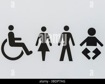 L'enseigne des toilettes en Suède affiche des symboles indiquant l'accessibilité pour les personnes handicapées, des installations séparées pour les femmes et les hommes, et Baby cha Banque D'Images