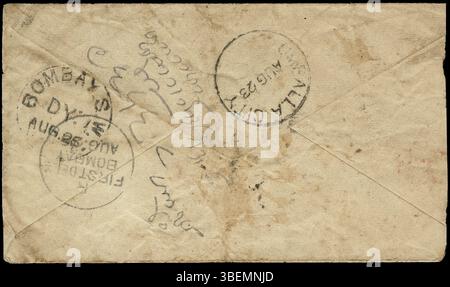 Une enveloppe de papeterie postale, envoyée de Jind à Bombay vers 1882-85, est écrite en écriture Landa. L'enveloppe est affranchie avec un timbre postal QV 1/2 anna et comporte des oblitérations en forme de coeur d'Umbala et de Bombay, indiquant son histoire de transit. Banque D'Images
