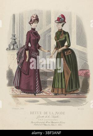 Paris, Godchaux & Cie, Auguste, Cheffer, E., Chillot, A., revue de la mode, Gazette de la famille, dimanche 14 décembre 1884, 13e année, N° 676 : jupons & corsets, Paris, au milieu - gravé, deux femmes au fond d'un escalier dans un couloir. A gauche : robe de marron marron 'cachemire de l'Inde' (cachemire), rayée en bleu et gris et velours marron marron. A droite : robe ou redingote de vert mousse 'bure saint François' ornée de 'velours de chasse'. Boutons métalliques. Chapeau orné de plumes rouges et voile. Sous la présentation quelques règles de publicité texte pour différents produits. Imprimer f Banque D'Images