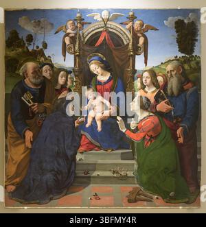 Vierge et enfant intronisés avec les saints par Piero di Cosimo, retable de la Renaissance avec Pierre, Jean, Elizabeth, Catherine et les anges, Florence, Banque D'Images